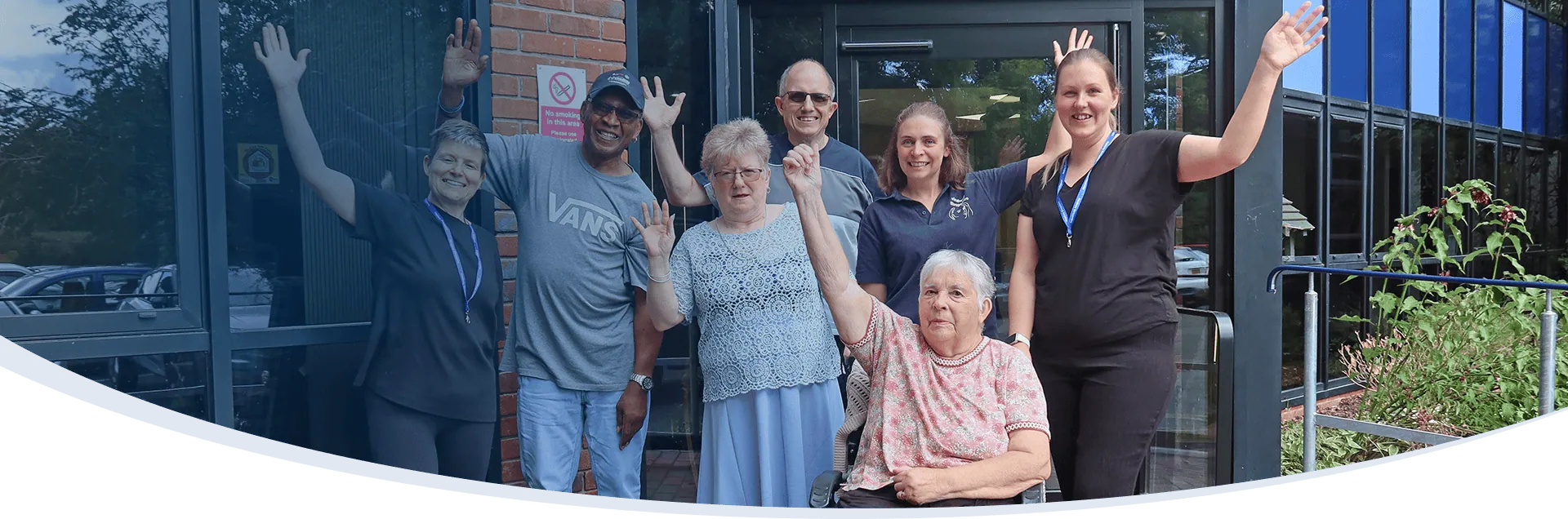 Patients and Staff celebrating outside Headway Shropshire