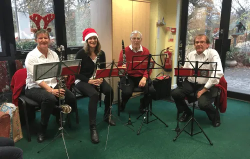 Winter fair - people playing different brass instruments
